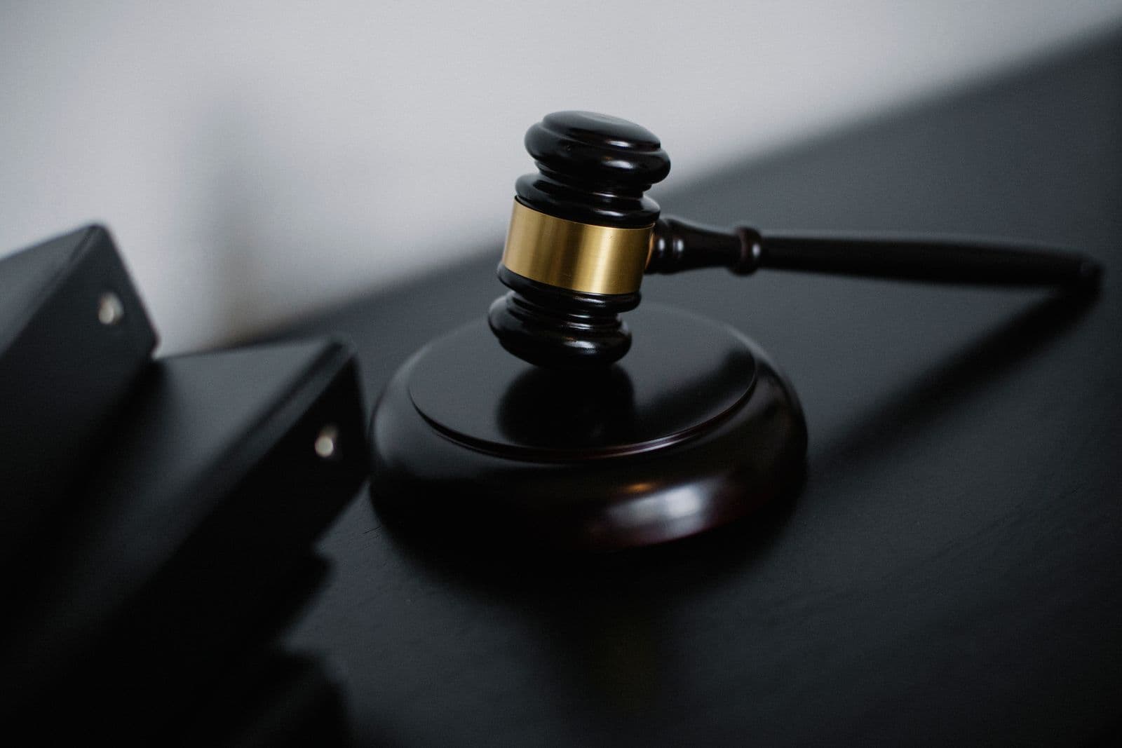 A wooden gavel on a desk